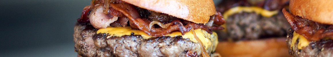 Eating Burger at Pop's Burgers restaurant in Huntington Park, CA.